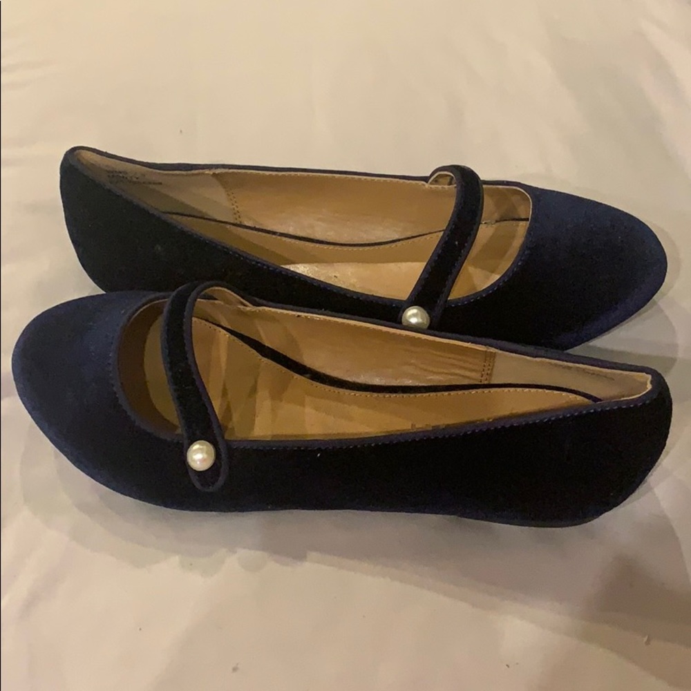 Never worn- blue flats